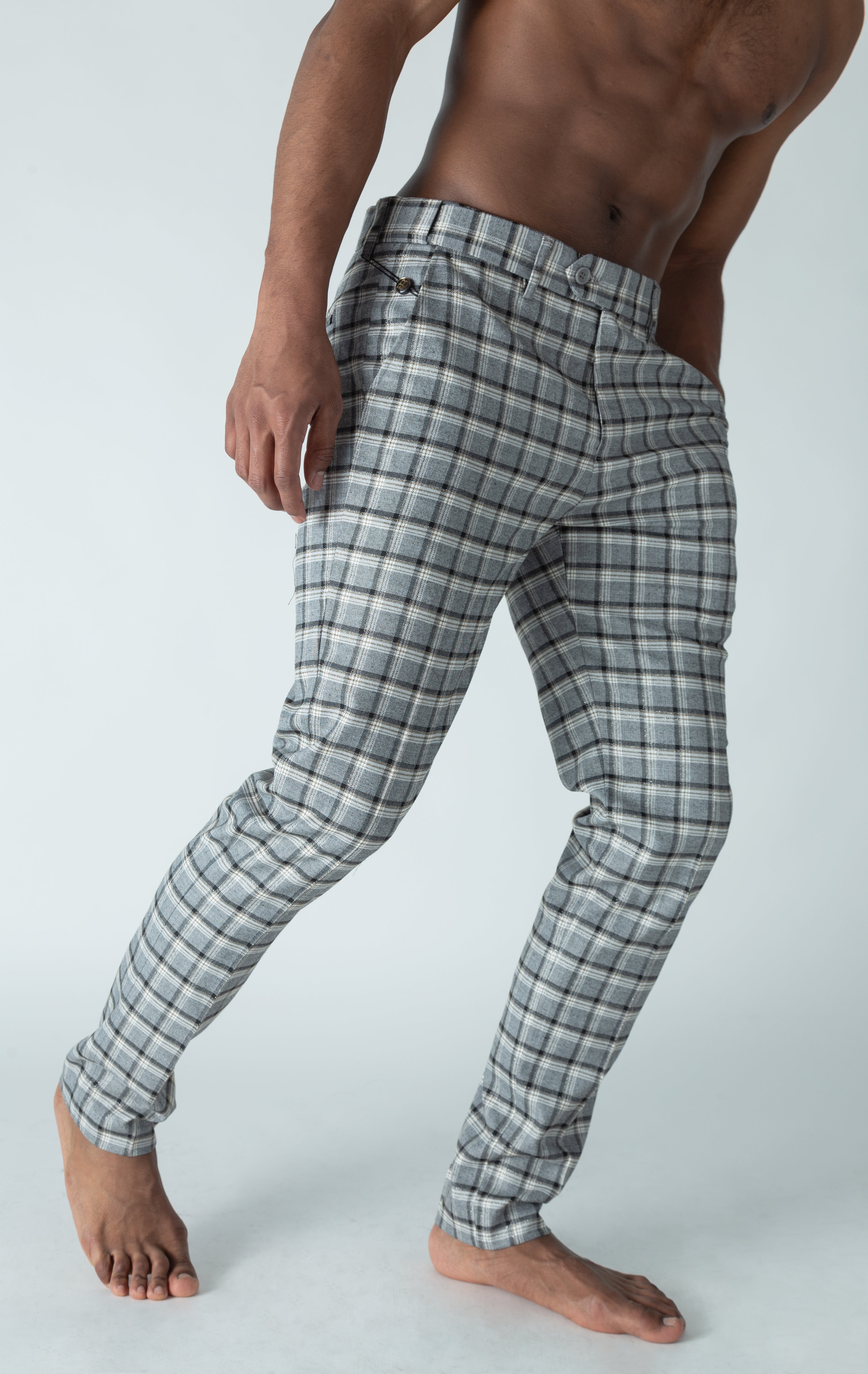 Men's grey chino pants with a checkered plaid design. The pants feature an elastic waistband for comfort and stretch, and are made from a lightweight cotton-spandex blend fabric. Inseam is 32 inches.